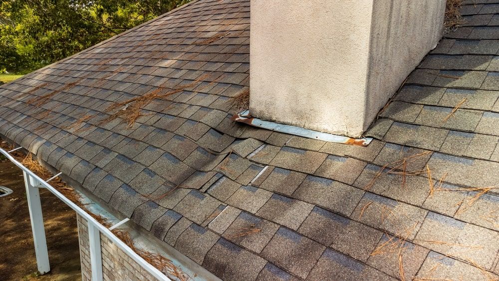 damaged roof flashing and roof water damage