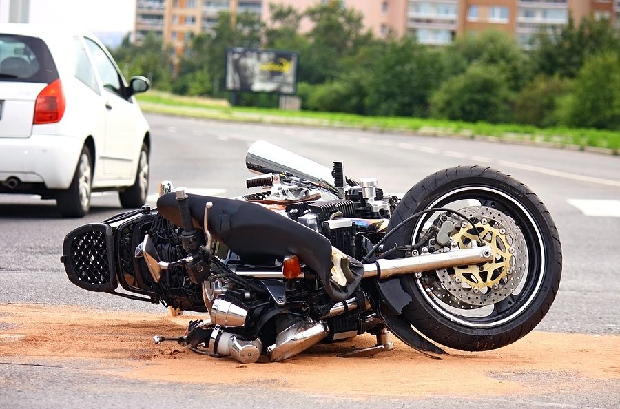 A motorcycle crashed in the road 