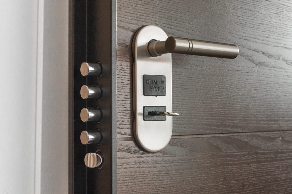 A close up of a door handle and lock
