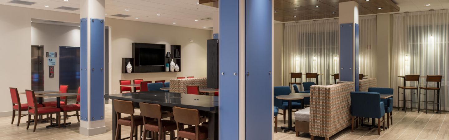 Holiday Inn Express Public Area Millwork and Quartz