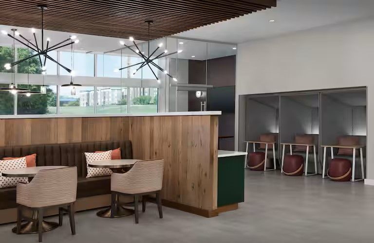 Homewood Suites & Tru by Hilton Lobby Millwork, Including Custom Wall Paneling
