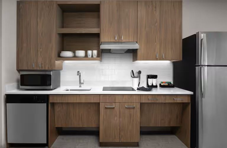 Homewood Suites & Tru by Hilton Bedroom Kitchen Quartz and Cabinets