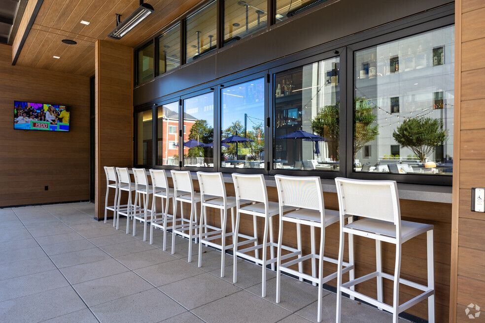 The National Apartments Outdoor Lobby Bar with Custom Countertops