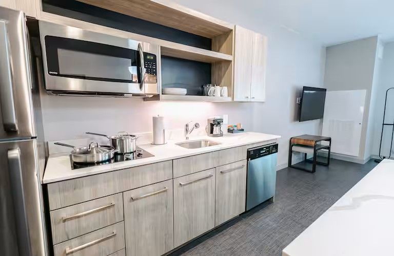 Homewood Suites by Hilton Custom Guest Kitchen Millwork and Quartz