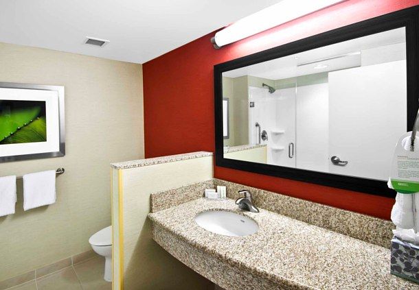 Courtyard Shower Surround and Quartz Counters.