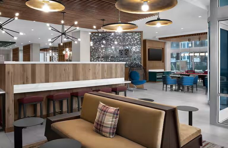 Homewood Suites & Tru by Hilton Custom Lobby Focal Walls and Casework
