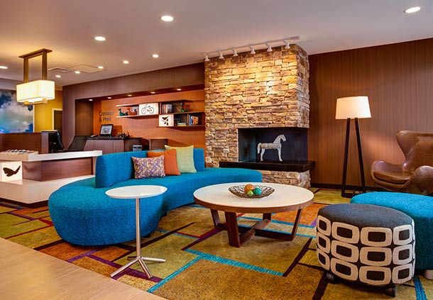 Fairfield Inn & Suites by Marriott Lobby Millwork Focal Wall