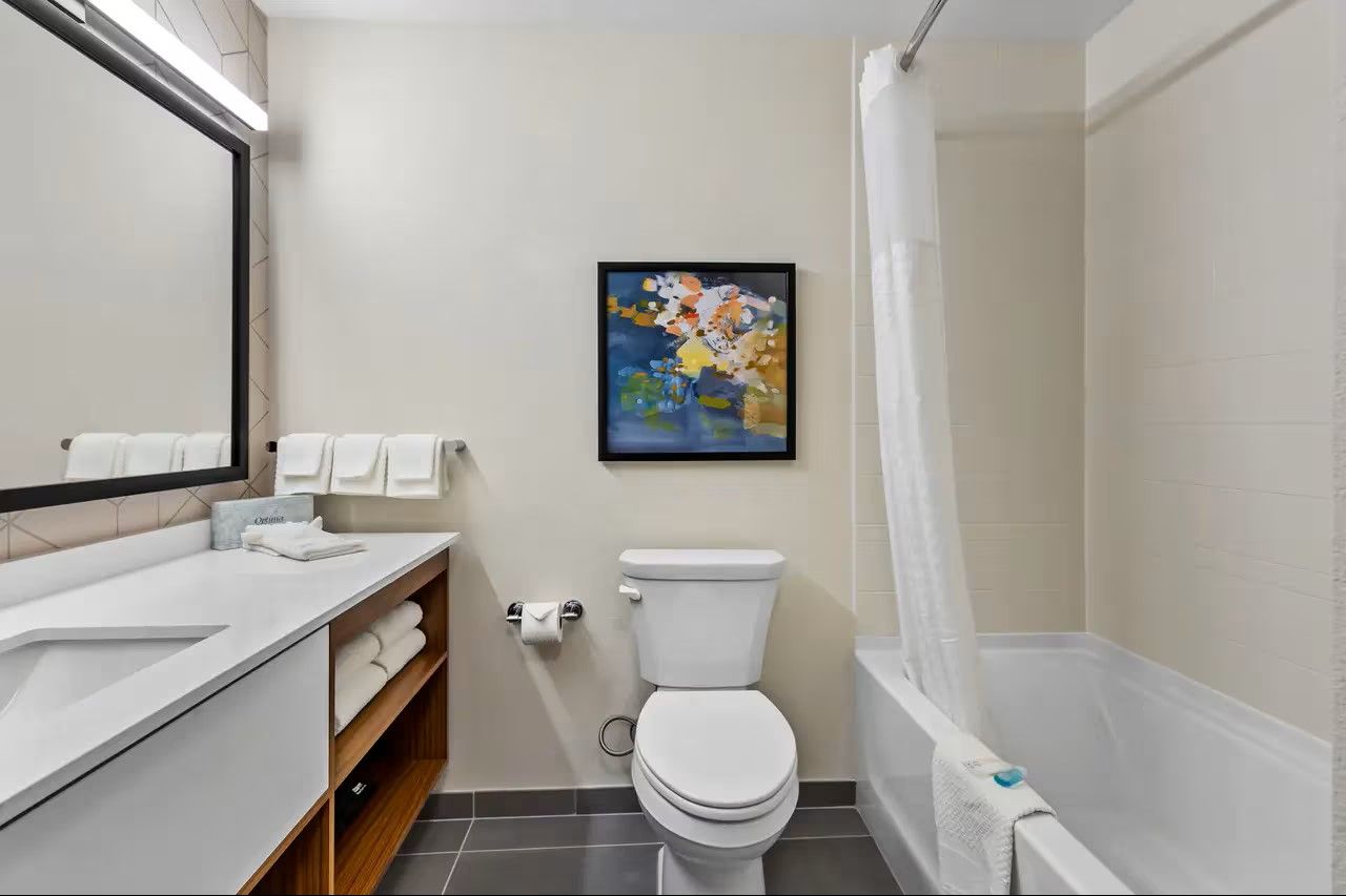 Everhome Suites by Choice Custom Bath Shower Surround, Countertops, and Millwork