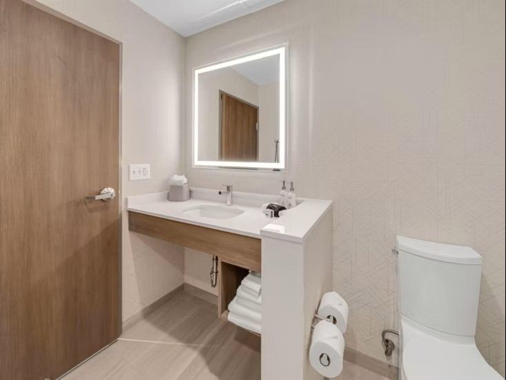 Holiday Inn Express Custom Bath Vanity Millwork Base and Quartz Top