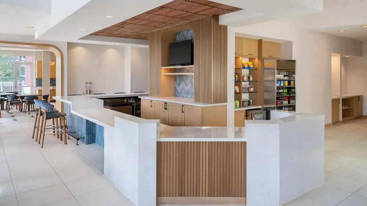 Hyatt Place Custom Lobby Front Desk Millwork and Quartz