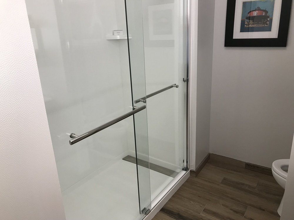 Hampton Inn Custom Shower Pans and Shower Doors