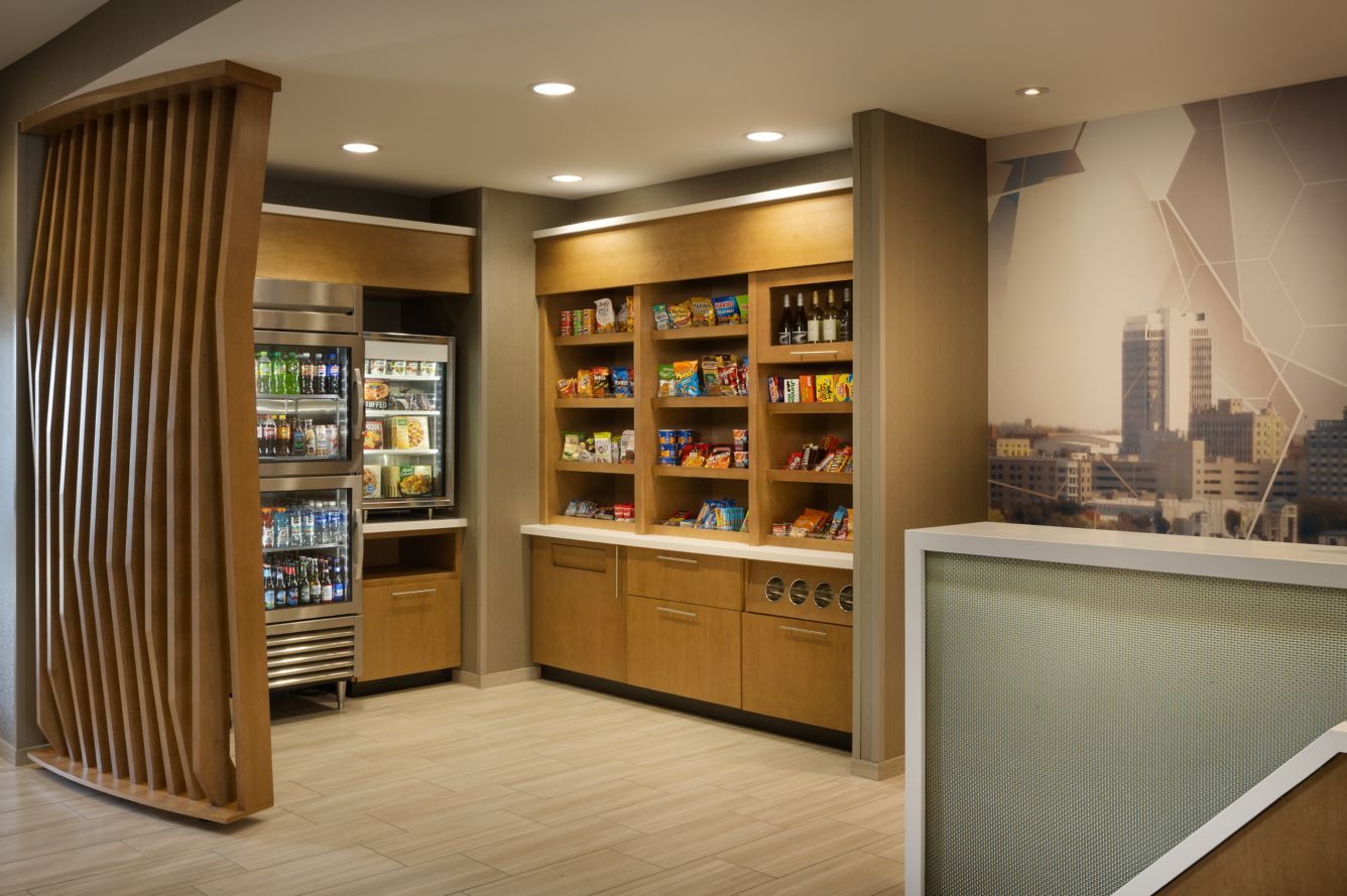 Springhill Suites by Marriott Custom Weave Wall and Market Cabinetry, and Quartz Counters