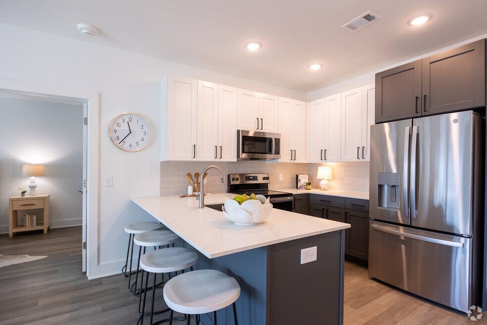 The National Apartments Kitchen with Custom Quartz Countertops