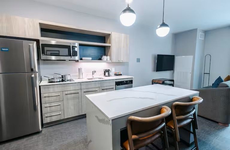 Homewood Suites by Hilton Custom Millwork and Marble-Look Quartz