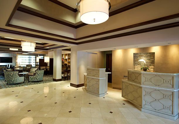 Courtyard Front Desk Millwork and Granite Countertops