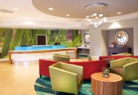 Springhill Suites Custom Front Desk Millwork and Quartz