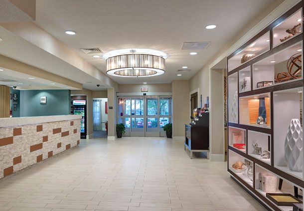 Residence Inn Custom Casework Focal Wall and Reception Desk Millwork