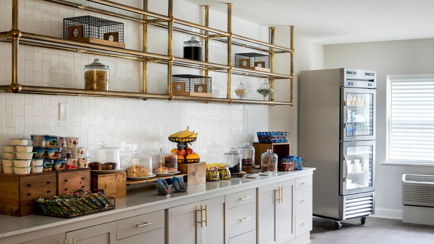 Delta Hotel Basking Ridge Custom Breakfast Bar Countertops and Brass Shelving