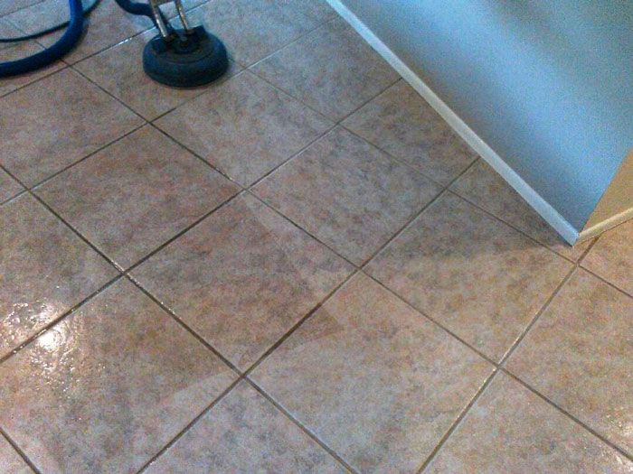 cleaning tiles with a professional cleaner