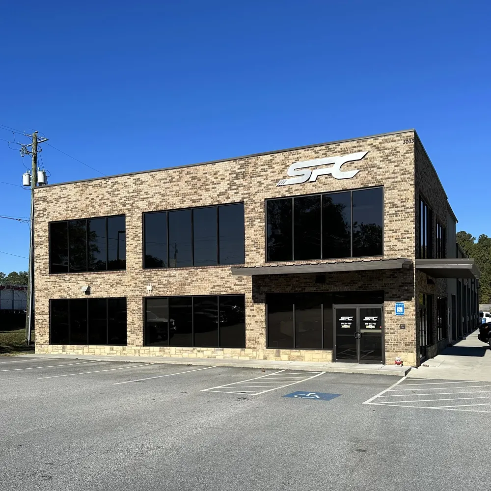 a building with a parking lot