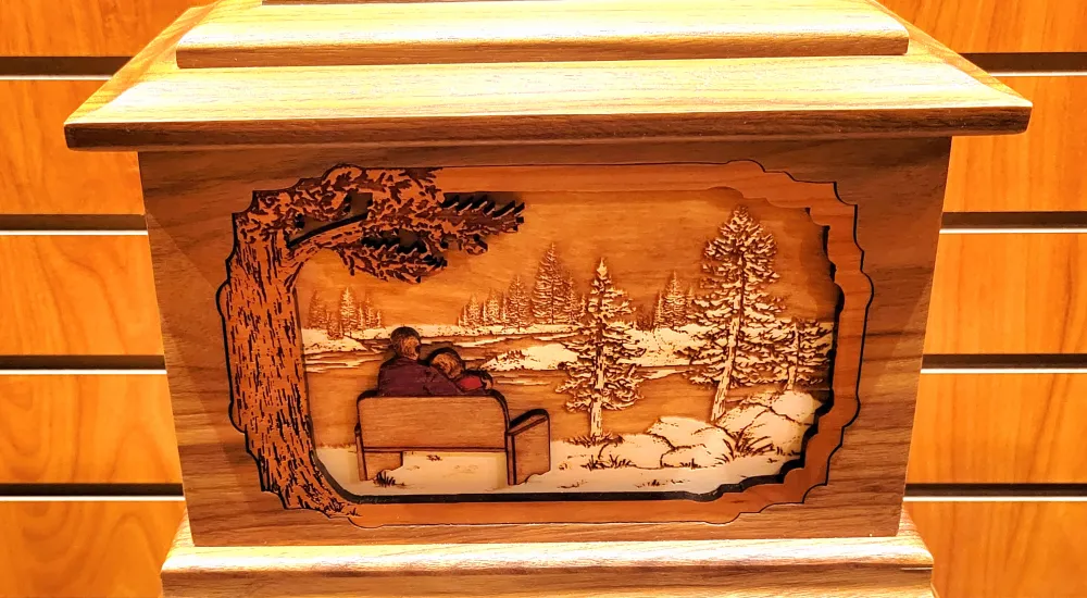 a wooden box with a picture of a boat on it
