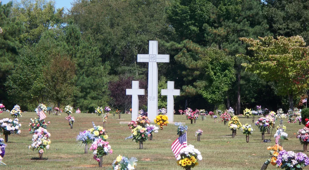 a large group of people in a cemetery