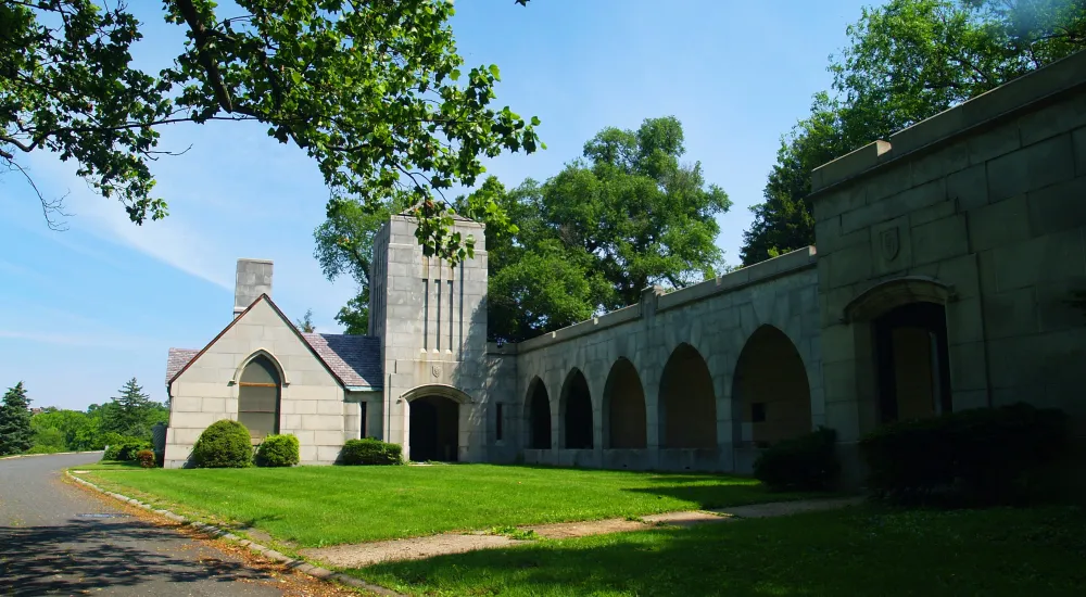 a stone building with arched windows