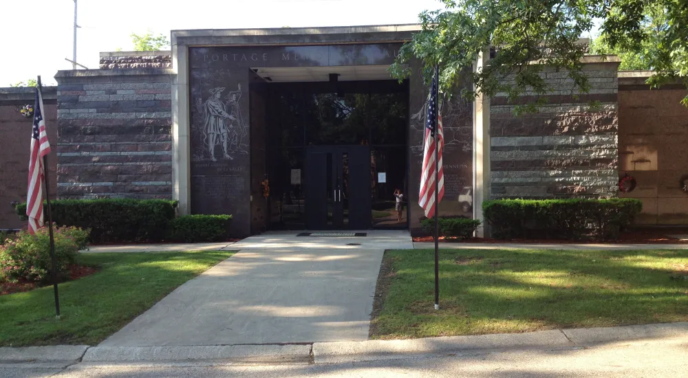 a building with a flag in front