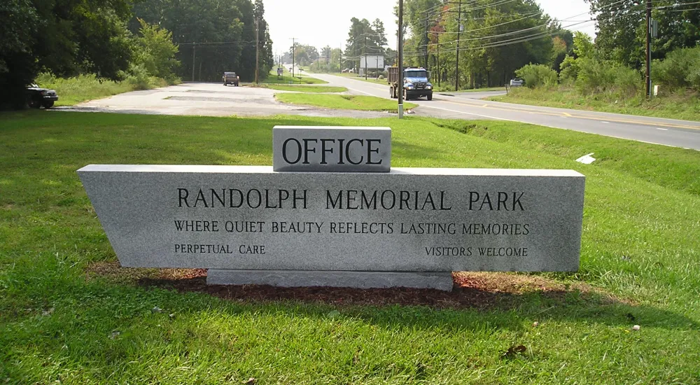 a sign in a park