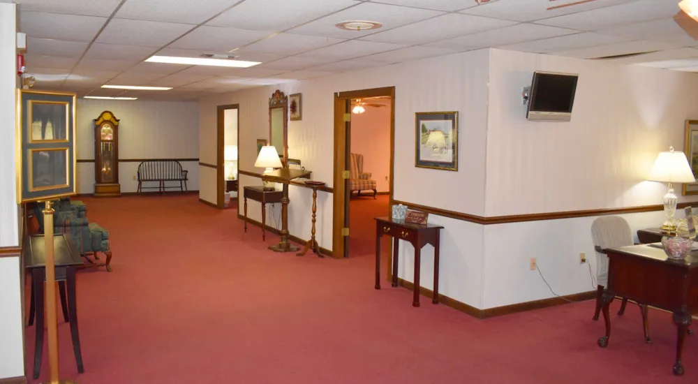 a room with a red carpet