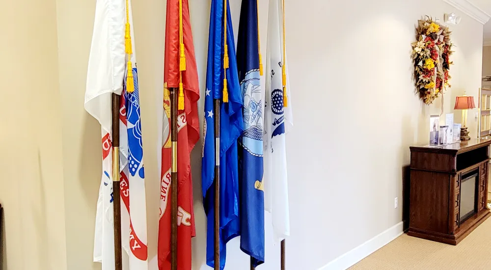 a group of flags from a wall