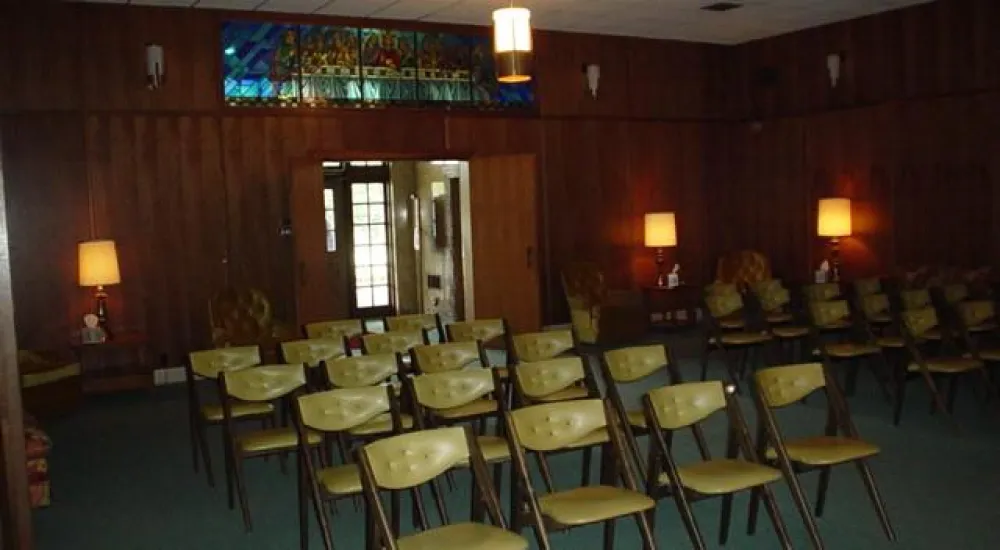 a room with tables and chairs
