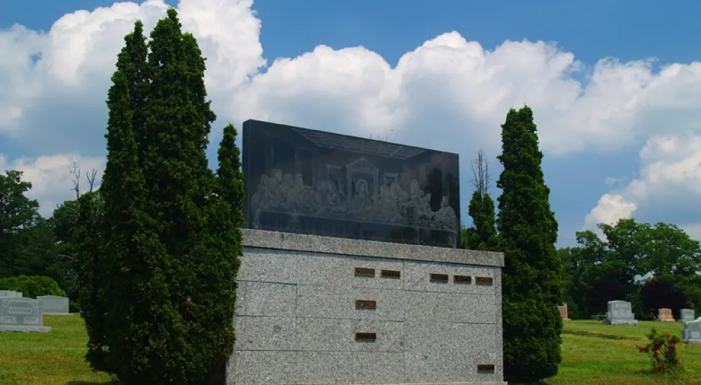 a stone building with a sign on it