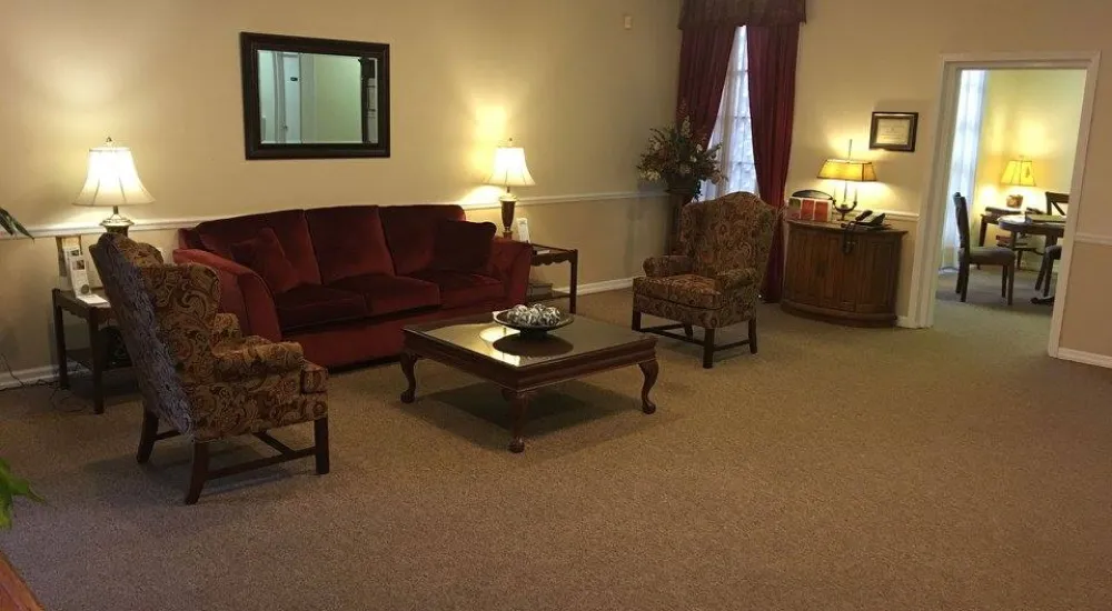 a living room with a red couch
