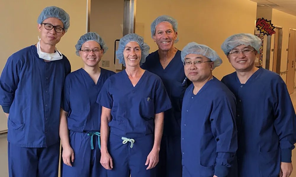 Dr. Barrett Hosts Visiting Surgeons