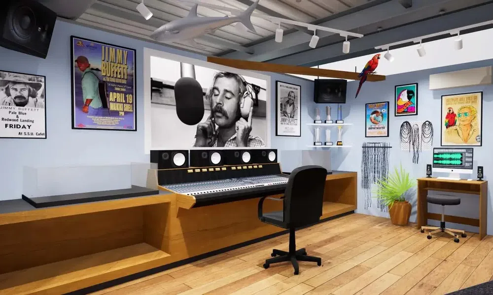 Modern music studio with mixing console, black office chair, framed posters, and a large black-and-white musician portrait.