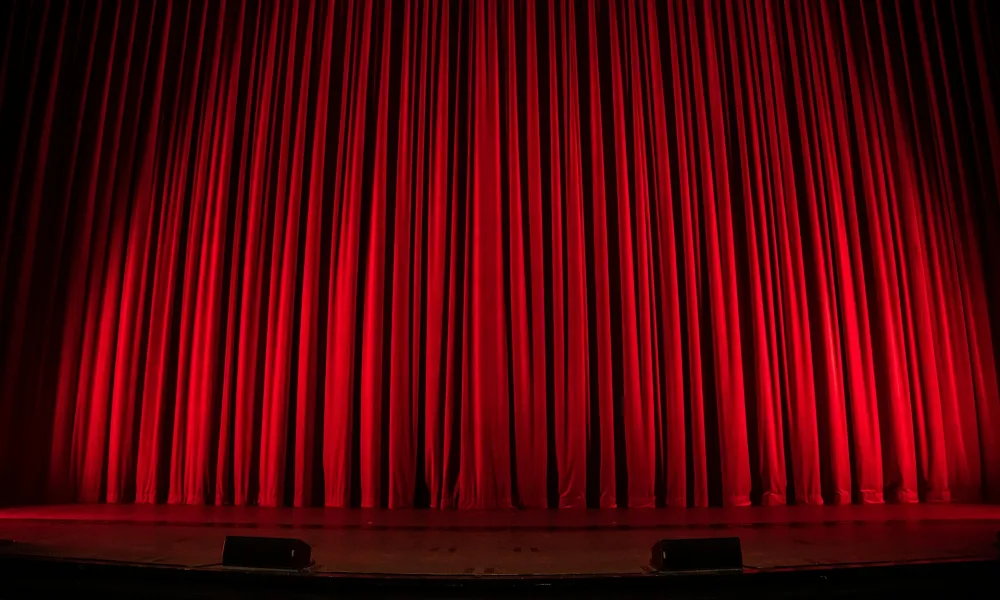 a stage with a curtain