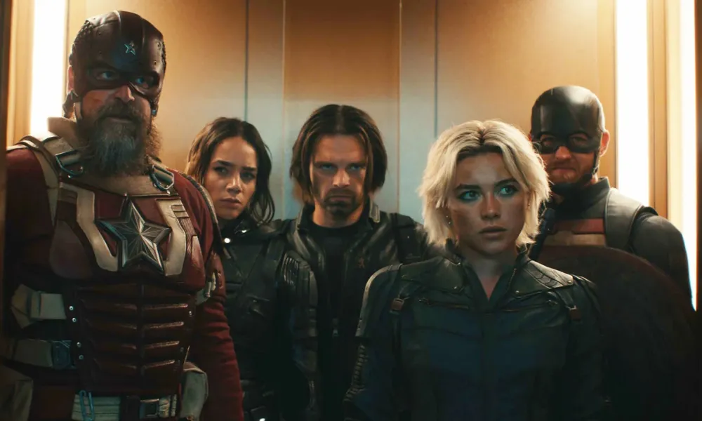 Five Marvel superheroes including Captain America and Black Widow in an intense elevator scene.