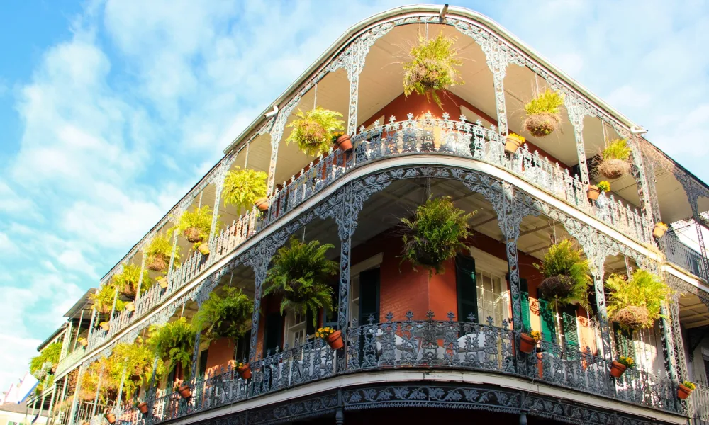 a building with plants growing on the roof