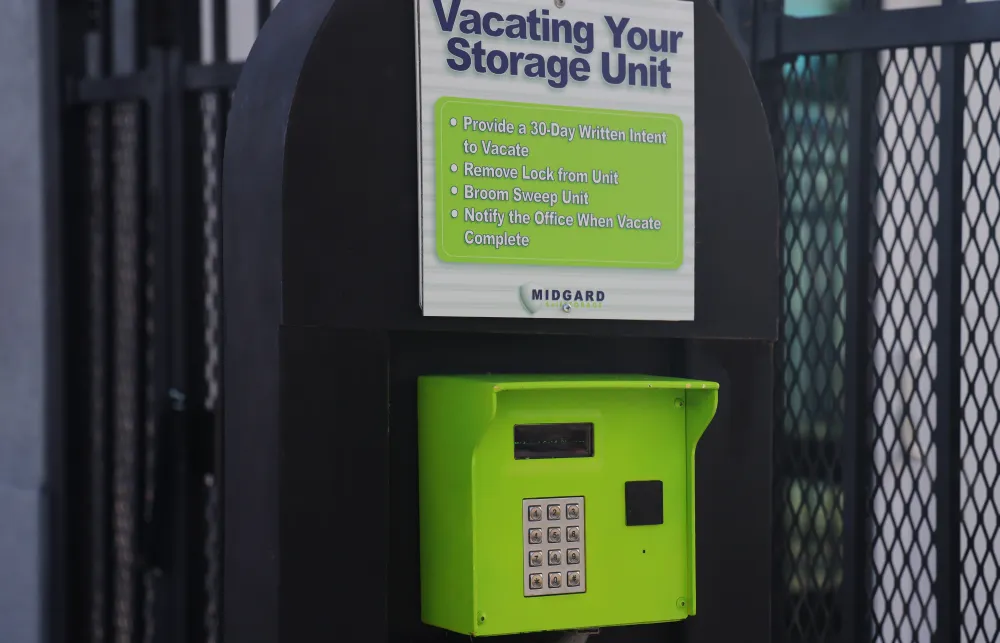 a green and white box with a sign on it