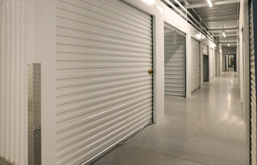 a hallway with white doors