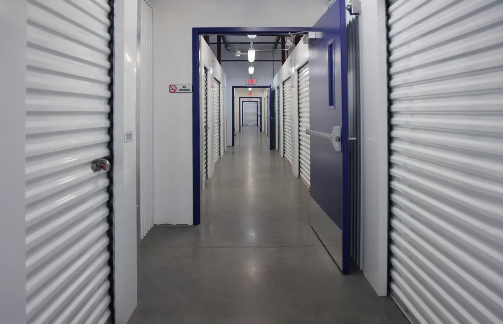 a hallway with blue doors