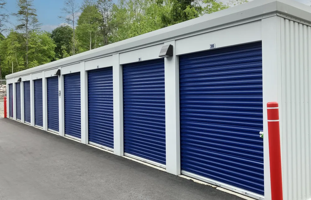 a white building with blue doors