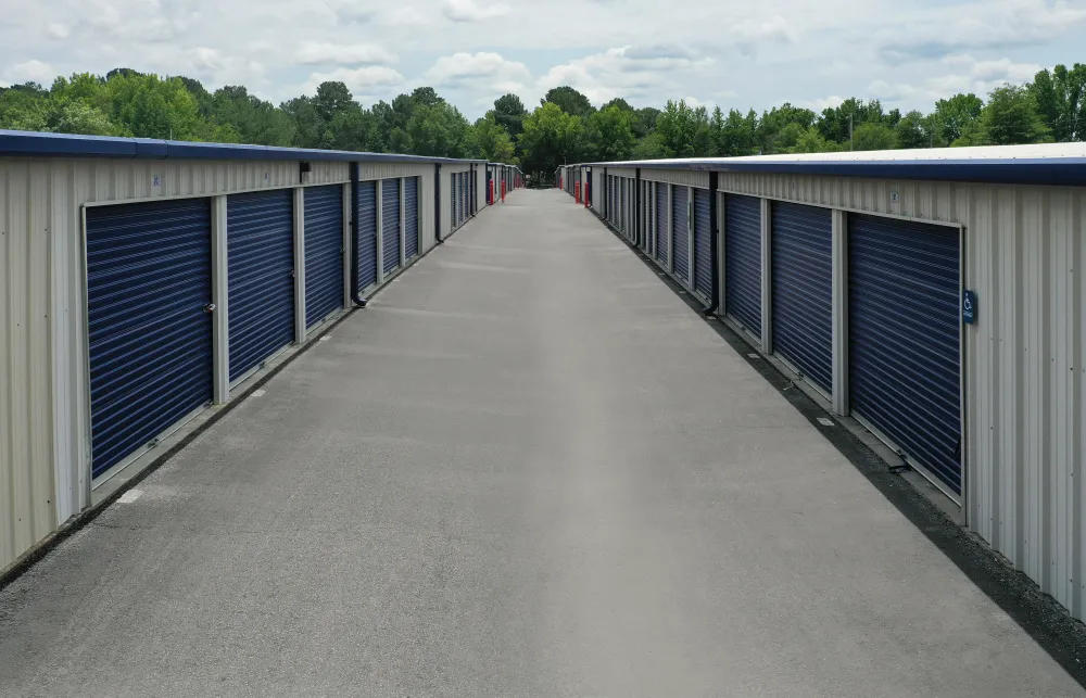 a row of white and blue metal containers