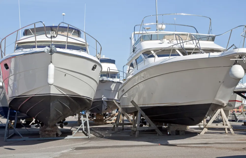 a group of boats parked on the dock