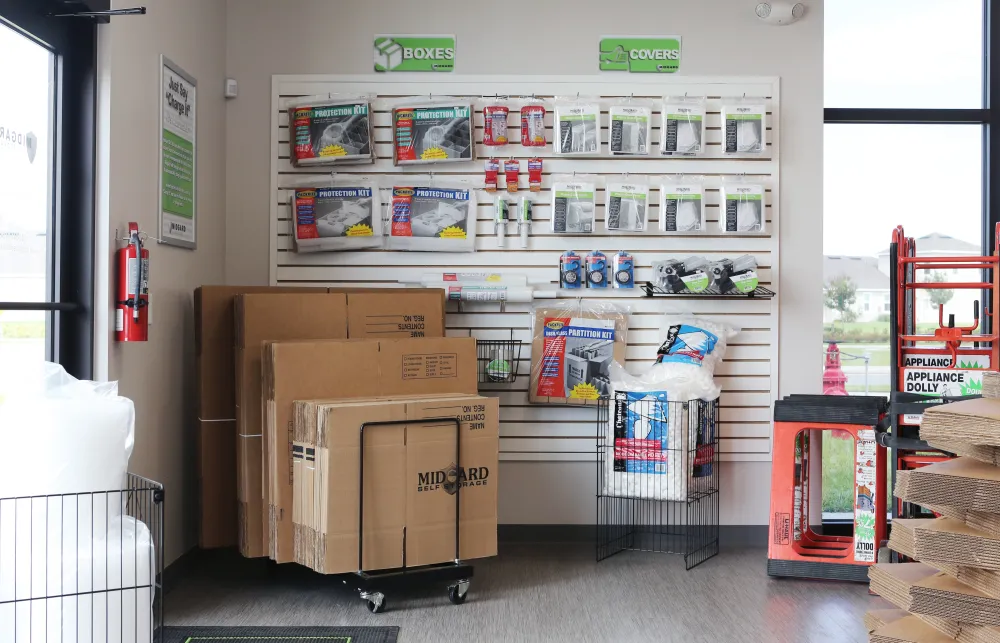 a room with shelves and boxes