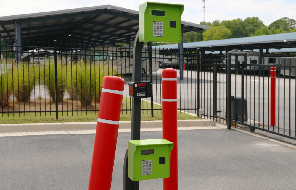 a group of orange and white poles