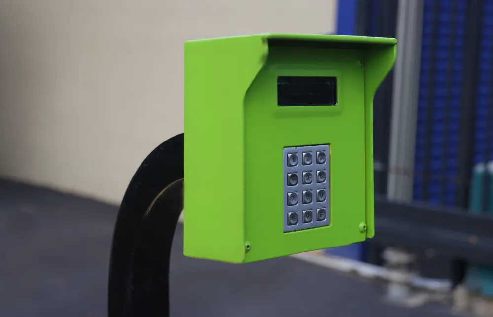 a green and black telephone