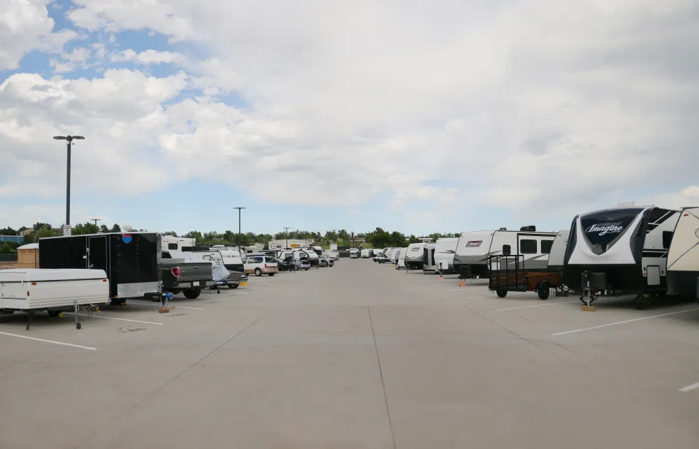 a group of vehicles parked in a parking lot