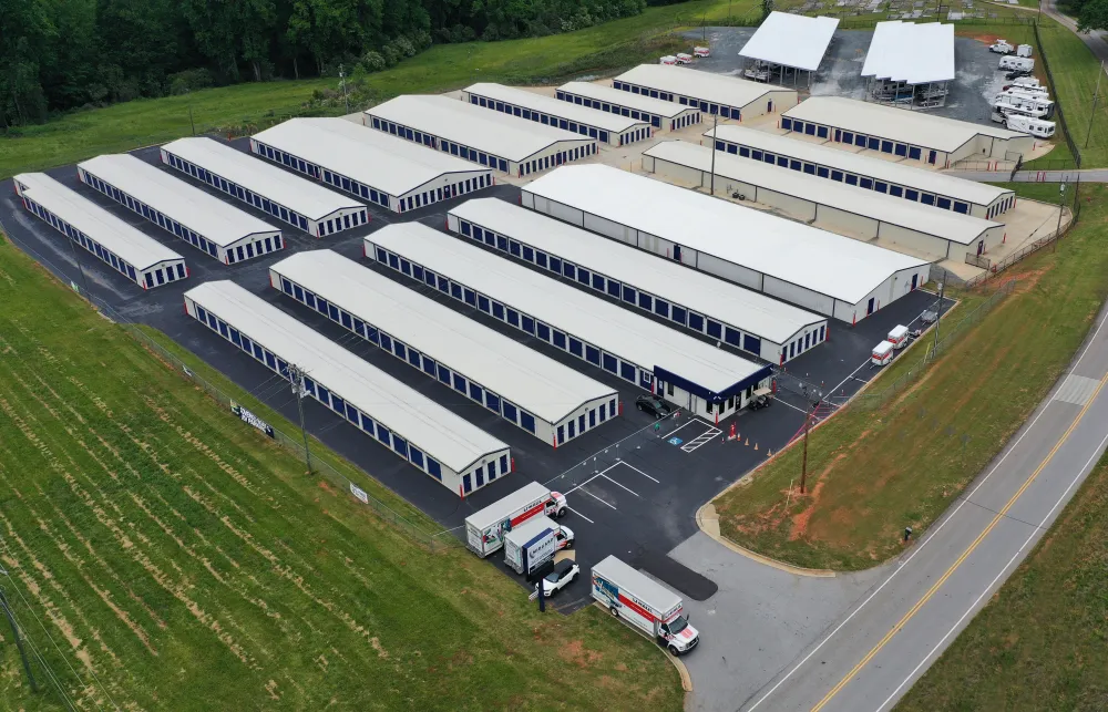 a large building with a parking lot